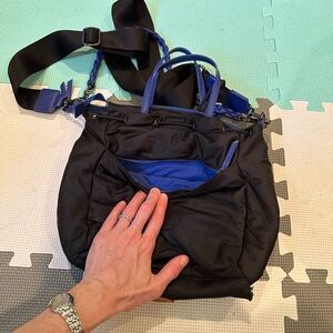 Black and blue MZ Wallace crossbody - very good used condition- lots of pockets